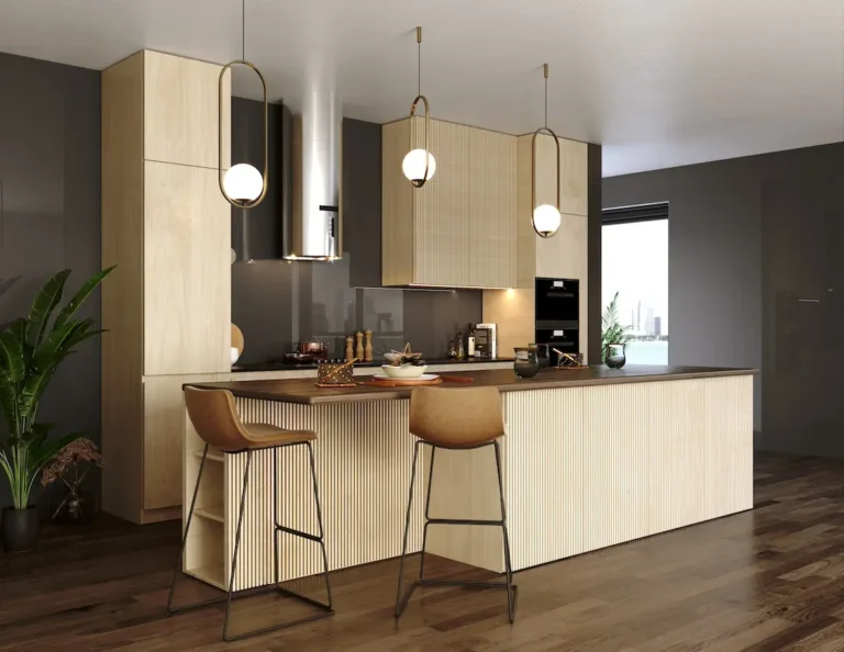 Cocina con encimera y sillas